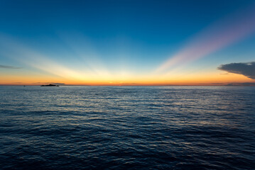 Sunset in the Gulf of Tomini, on the Togian Islands, off the coast of Central Sulawesi in Indonesia.  The Togian Islands are a paradise for divers and snorkelers.