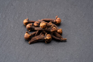 Dried cloves  spice  isolated on black background. 