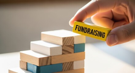 Fundraising Hand Building Blocks Strategy Finance Donation Charity Concept