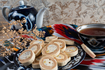 Uzbek Halva with Pistachios on Traditional Ceramic Plate