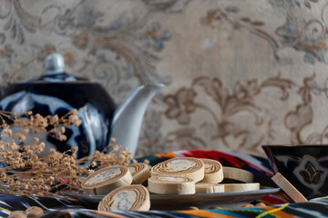 Uzbek Halva with Pistachios on Traditional Ceramic Plate