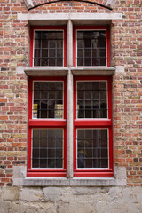 Bruges (Brugge), Belgium - October 17, 2022. Door and window of old houses in european city.