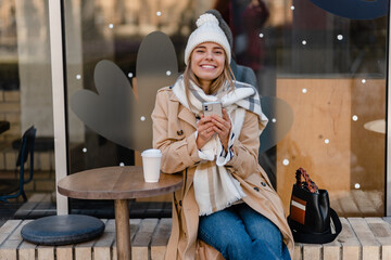 stylish woman walking in winter street