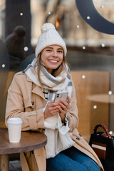 stylish woman walking in winter street
