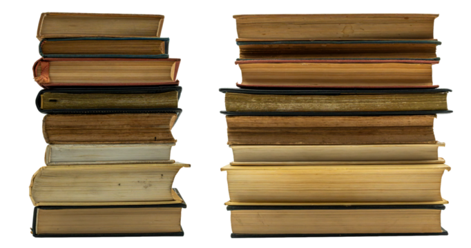 Close-up of two stacks of old vintage books isolated. Concept of education, literature, history, and knowledge.