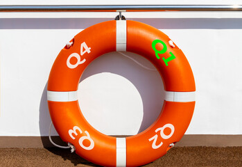 1st first quarter symbol. Beautiful orange lifebuoy with words Q1 Q2 . Beautiful white background....