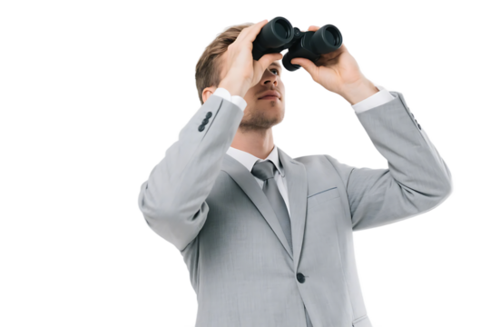 A businessman in a suit uses binoculars to survey the distance, symbolizing seeking future business opportunities.