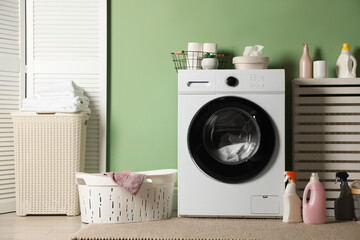 Laundry room with modern washing machine. Interior design