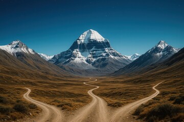 Curving Dirt Roads Leading toward Snow-Capped Mount Kailash under Clear Blue Sky
