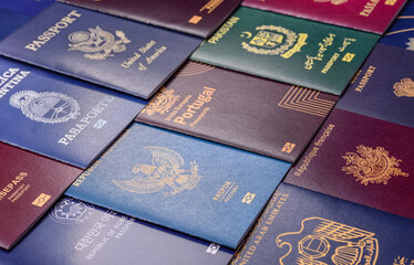 Fototapeta premium A background of several passports from different countries, an international ID card. Passport