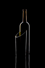 Still life with glass objects on a black background