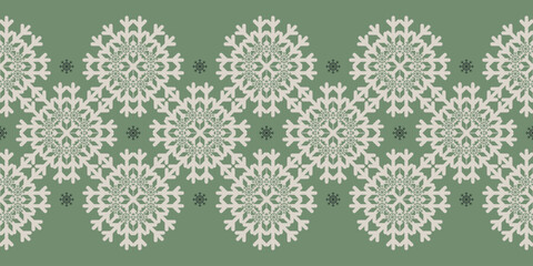 Beautiful Christmas seamless vector snowflake Border on green background. Monochrome seasonal pattern for wrapping paper, greeting cards, invitations, gift boxes and web background.