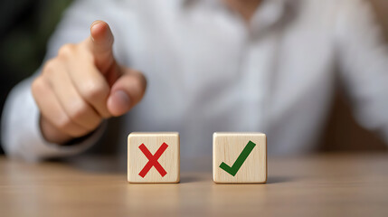 Making choices between right and wrong: The wooden blocks feature an 'X' and a checkmark, representing different options. A person selects a choice.