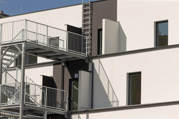 urban industrial facade, minimalist city building exterior, industrialstyle building with fire...