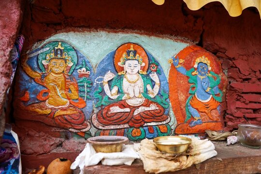 Colorful carved mural depicting Buddhist deities inside Tradruk Temple in Tsetang, Lhoka (Shannan), Tibet, showcasing sacred Tibetan art and traditional Himalayan craftsmanship.