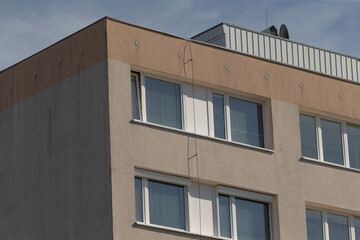 weathered city architecture, aged building with subtle details, old concrete building with small...