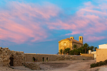 The Tabarca Island Historic Artistic Complex dates back to the 18th century and is surrounded by a wall   It is located off the coast of Alicante and is a protected marine reserve. Stunning sunset  