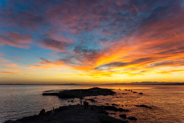 Dazzling sunset from Tabarca Island with Santa Pola in front in Alicante, Spain