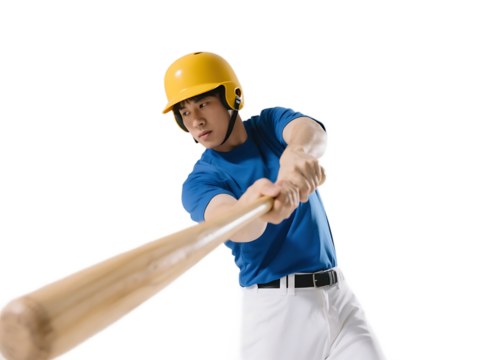 A young man in a blue shirt and white pants is swinging a baseball bat with a yellow helmet on.