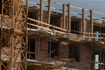 urban renewal utilizing construction materials, constructing modern cityscape through active industrial efforts, revitalizing and reshaping city using industrial construction and innovative materials