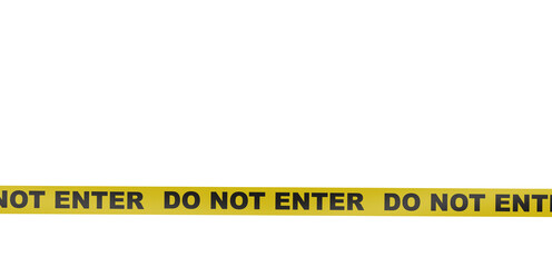 Yellow barricade tape against black background marked with Do Not Enter