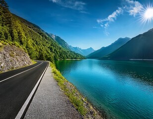 Scenic Mountain Lake Road: A Serene Journey Through Nature's Beauty, with Towering Peaks, Azure Waters, and Lush Greenery Under a Clear Blue Sky.