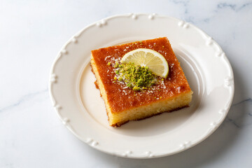Revani - sweet semolina cake with pistachio, traditional turkish dessert