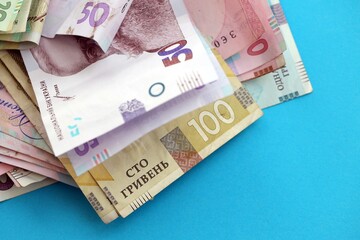 Big amount of different Ukrainian hryvnia money bills. Pile of crumpled ukrainian banknotes