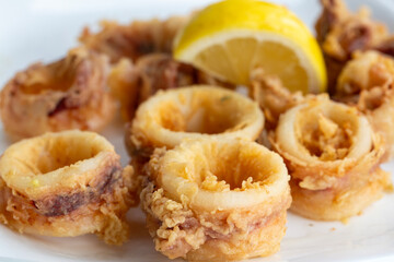 Fried Calamari: Tender calamari rings coated in seasoned batter