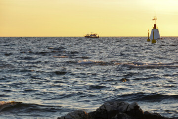 Beautiful sunset at the Adriatic Sea with waves
