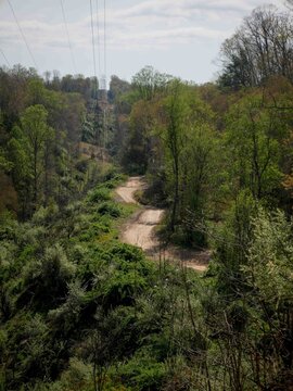 Far view of Hatfield Mccoy trail system in West Virginia in springtime under powerlines