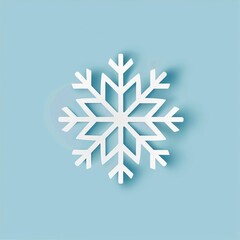 A beautifully designed white snowflake cutout contrasts against a soft blue background, symbolizing winter's beauty and tranquility while adding charm to seasonal decorations and designs.