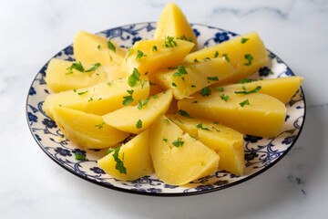 A plate of boiled potatoes