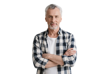 Middle-aged man in casual plaid shirt stands with arms crossed, showcasing a relaxed and confident appearance.