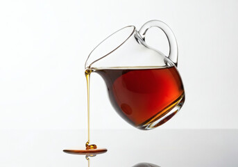 Image of a pitcher containing maple syrup
