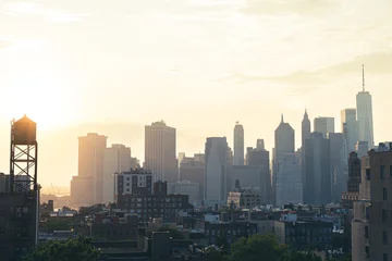Gardinen New York View of financial district Manhattan skyline and Brooklyn buildings at sunset  © Renata