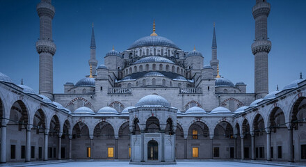 Obraz premium The blue mosque in istanbul, turkey, covered in snow during a winter day, showcasing its grand courtyard