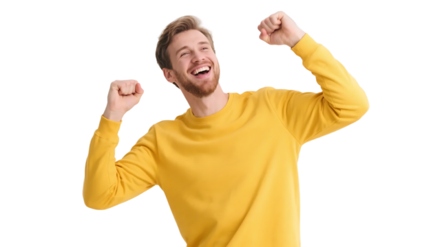 A man in a yellow sweater shows a joyful expression with raised fists, conveying a positive and excited mood.