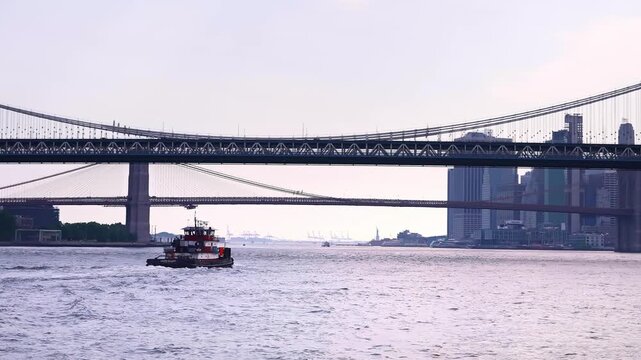 Manhattan bridge in New York City, Manhattan skyscrapers buildings. Concept of American modern urban life, commute to Brooklyn from NYC.