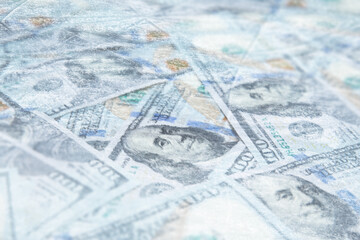 Money under ice. Many dollar bills frozen