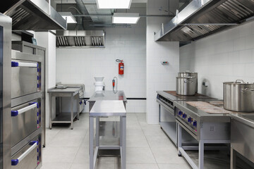 Modern Commercial Kitchen Interior with Stainless Steel Equipment