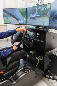 Multi-Screen Driver Training Simulator &mdash; Hands on Wheel in Cockpit