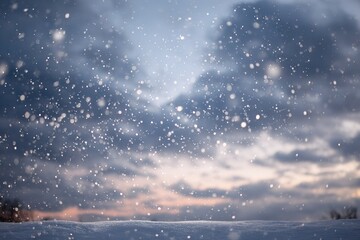 Naklejka premium Snowflakes fall gently against a cloudy sky at twilight creating a serene winter scene in a quiet landscape