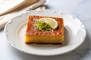 Revani - sweet semolina cake with pistachio, traditional turkish dessert