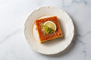 Revani - sweet semolina cake with pistachio, traditional turkish dessert