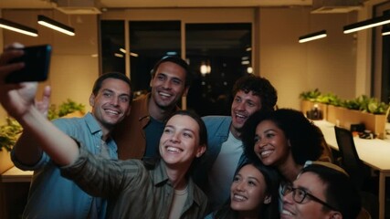 Diverse group of friends smiling together capturing moments in a cozy indoor setting. 4k Video footage