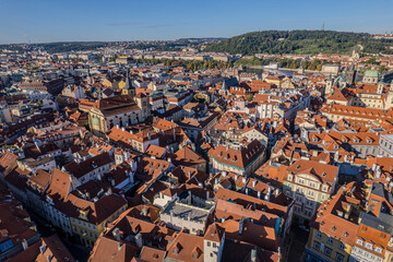Beautiful view of St. Nicholas Church in Prague’s Old Town Square, surrounded by historic buildings and vibrant city life in the heart of the Czech capital.