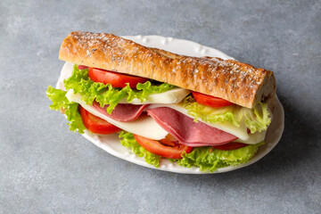 Cold sandwich with cheddar cheese and ham