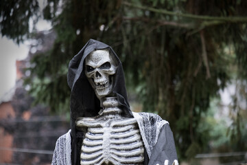 Skeleton models at Halloween outdoors.