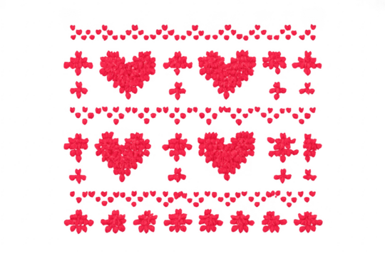 Red rose petals forming hearts and decorative patterns